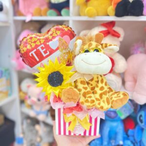 Tienda regalos originales Madrid regalo girasol jirafa peluche caja