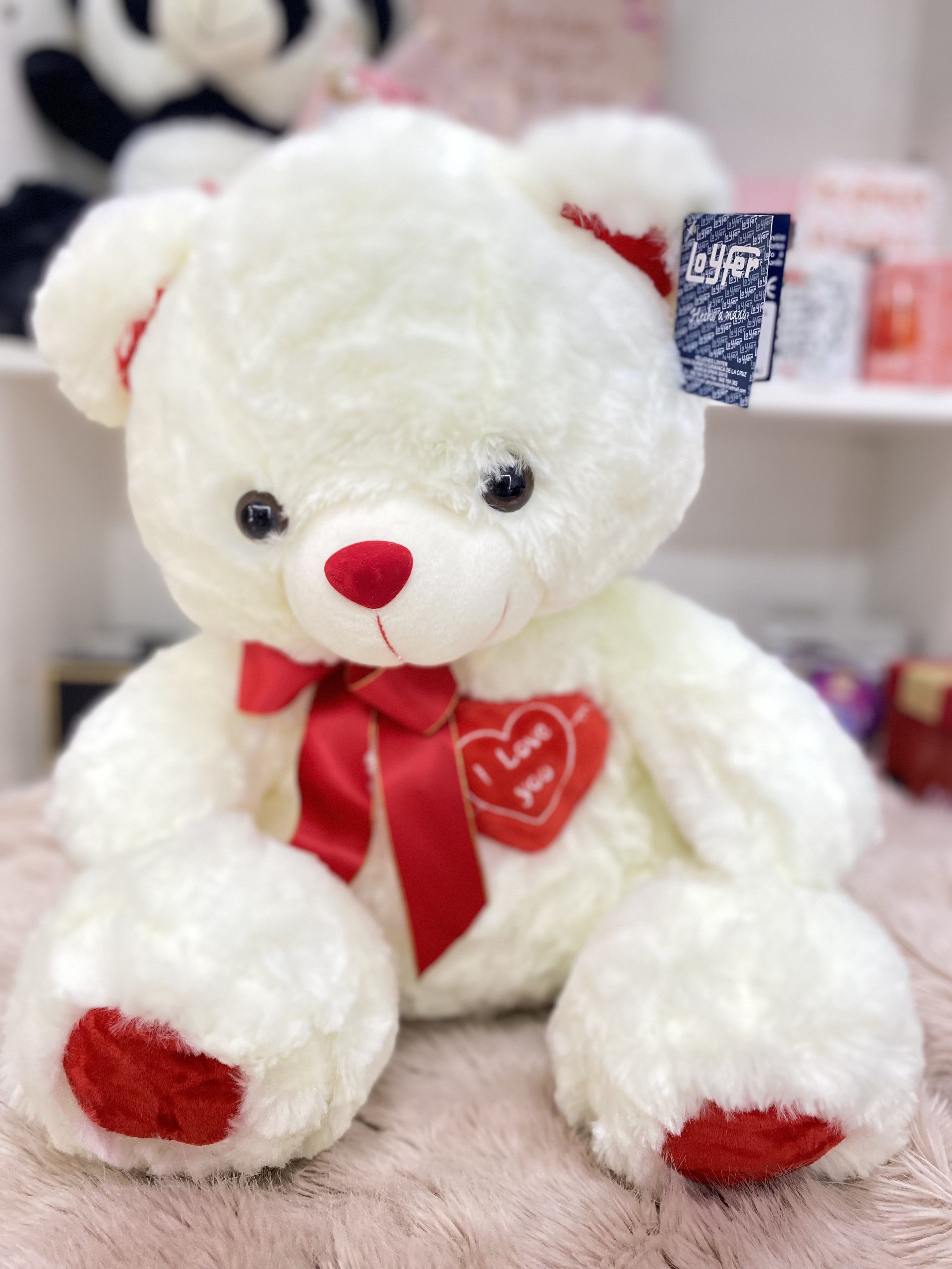 peluche oso con lazo rojo