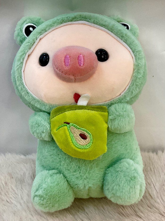 Cerdito disfrazado de rana