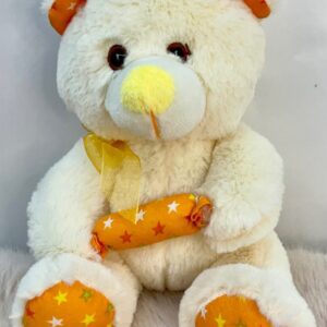 Peluche de osito con lazo dorado