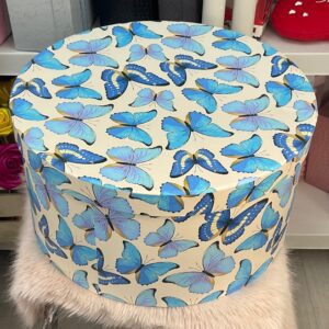 Caja de regalo redonda con diseño de mariposas azules – Elegancia y estilo