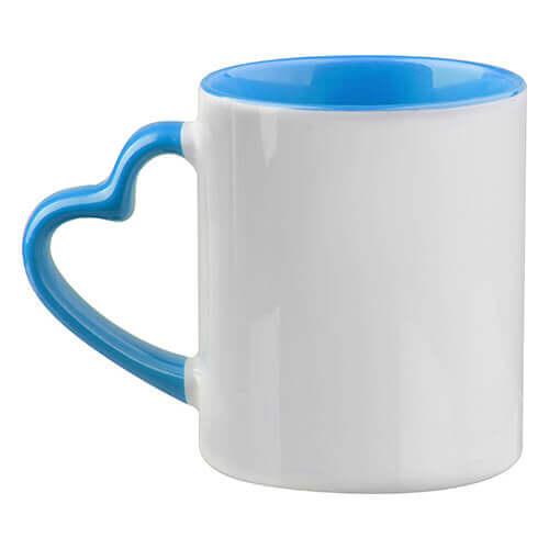 Taza blanca y azul con asa corazon que se personaliza a tu gusto