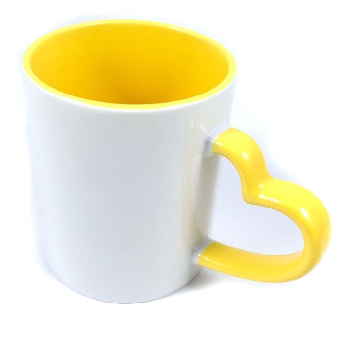 Taza blanca y amarillo con asa corazon que se personaliza a tu gusto