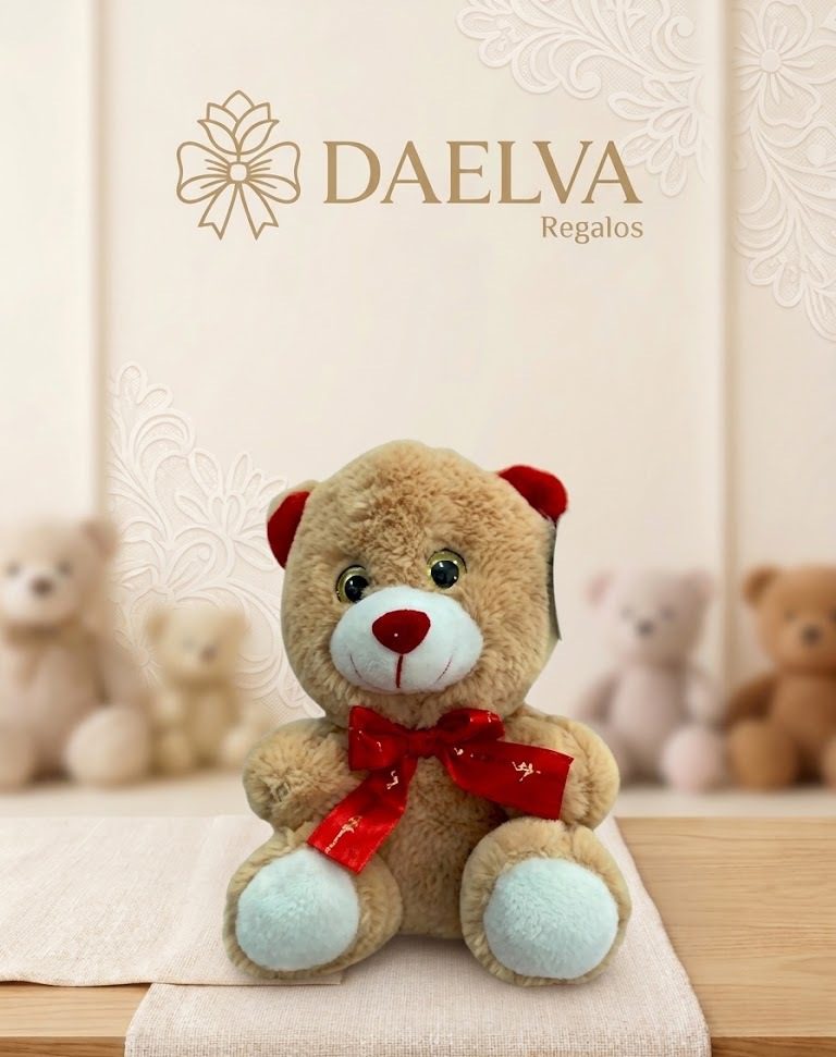 Osito de peluche beige con orejas y nariz rojas, patas blancas y un lazo rojo de cinta