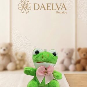 Ranita de peluche verde con ojos grandes y un lazo rosa y blanco