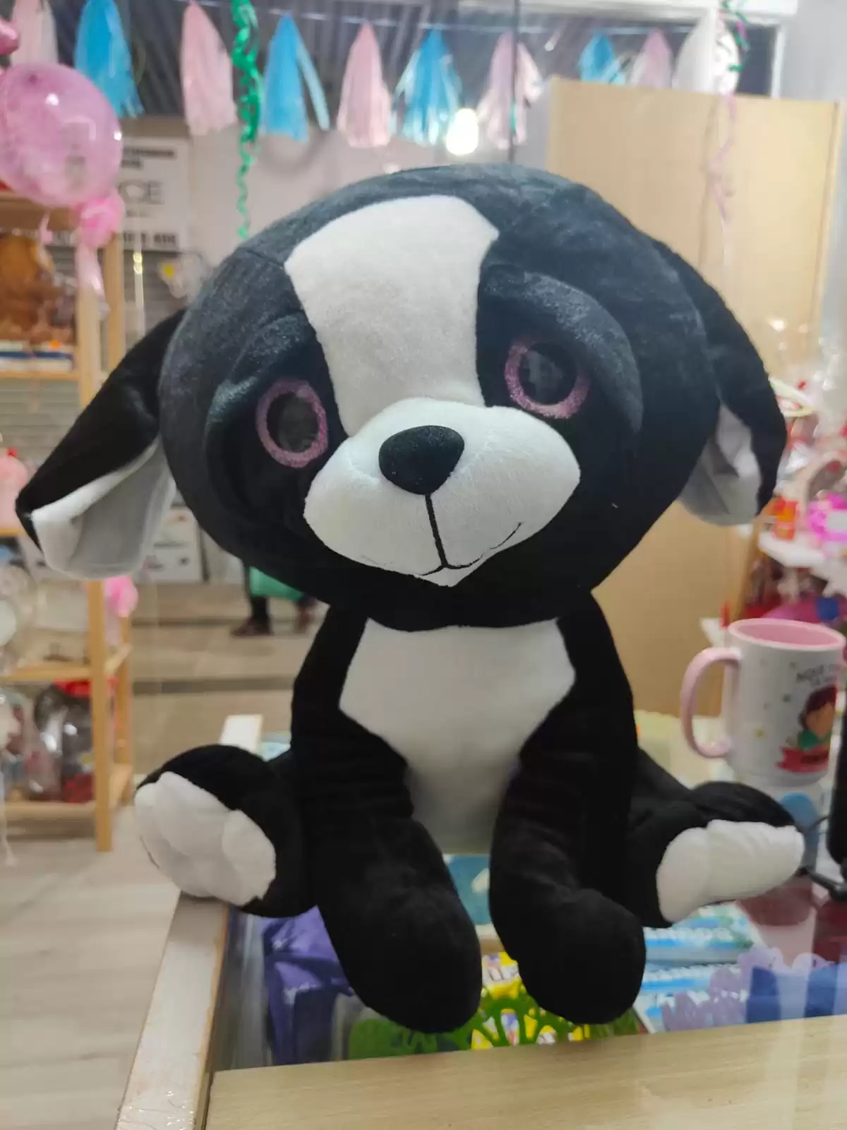 Peluchemediano de perro negro