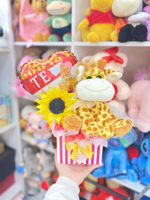 Tienda regalos originales Madrid regalo girasol jirafa peluche caja