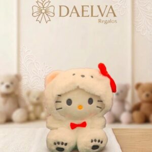 Peluche de gatita blanca con capucha de orejitas y lazo rojo, sentada sobre una base de madera
